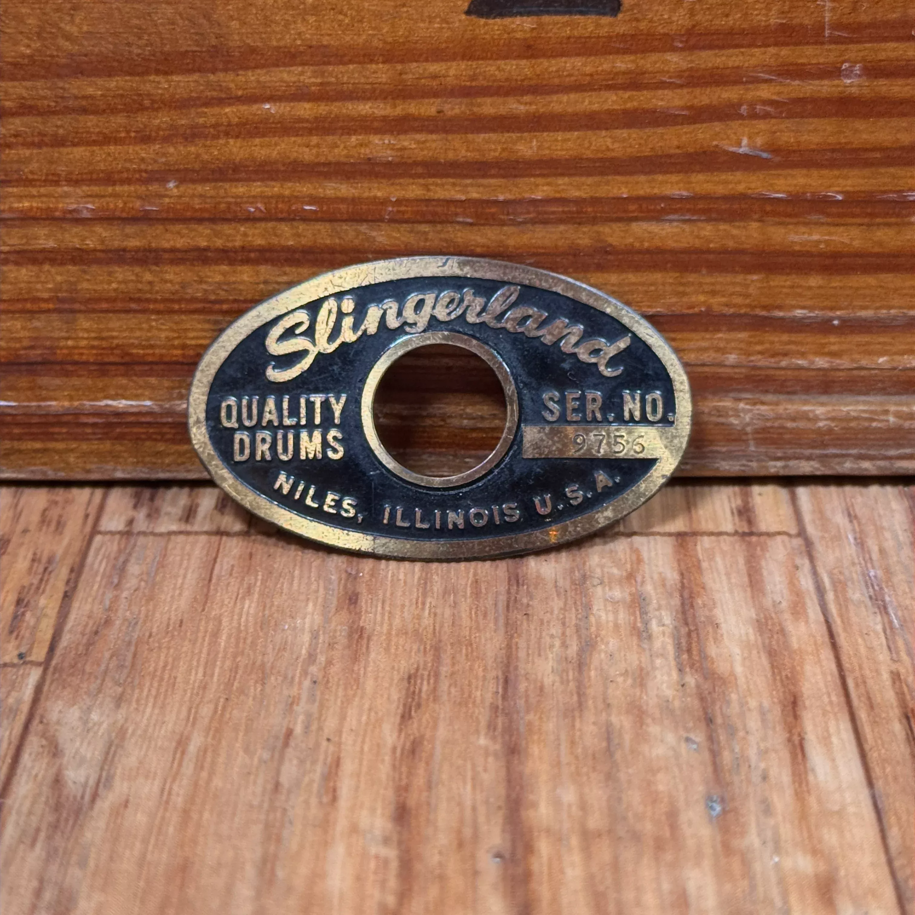 1960s-slingerland-black-brass-niles-badge-oval-serial-number 1960s Slingerland Black & Brass Niles Badge Oval Serial Number